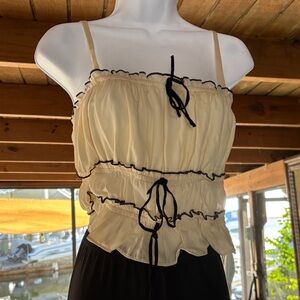 Elegant Cream Camisole with Black Accents
